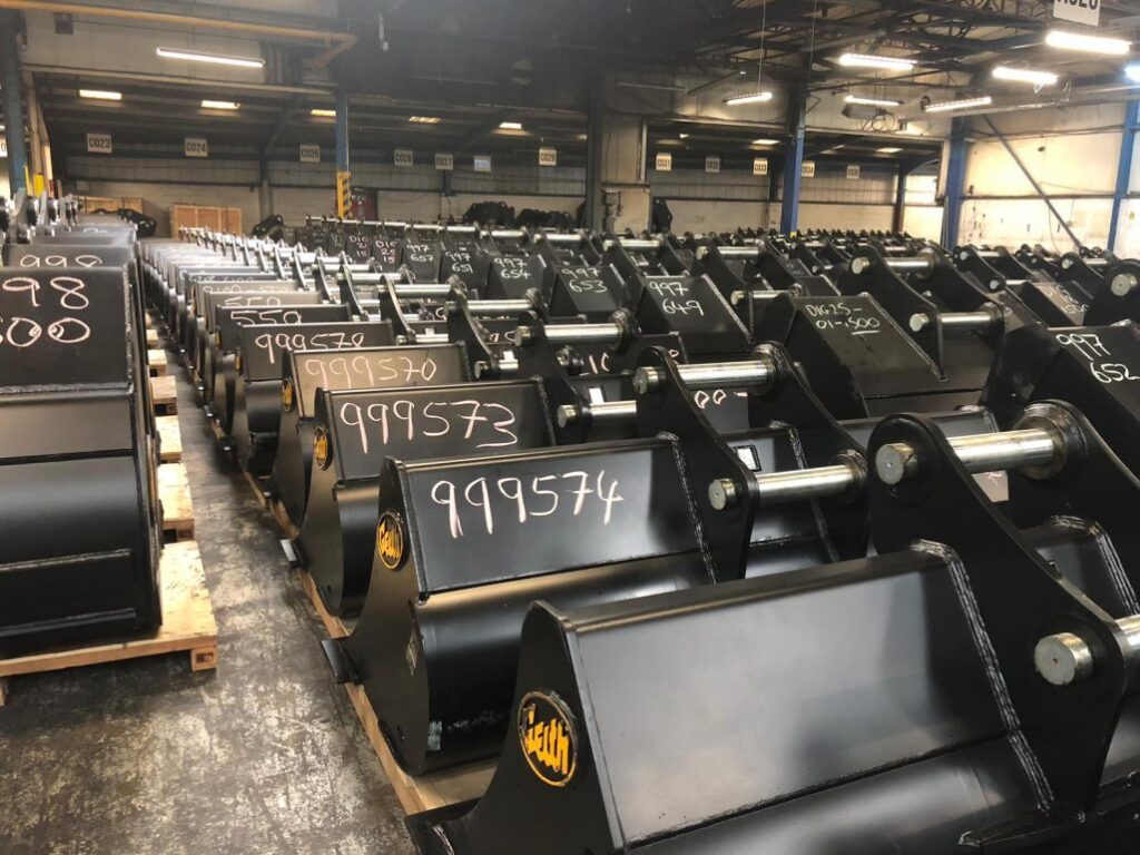 excavator buckets inside the geith distribution hub