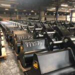 excavator buckets inside the geith distribution hub