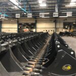 row of digging buckets inside geith distribution hub